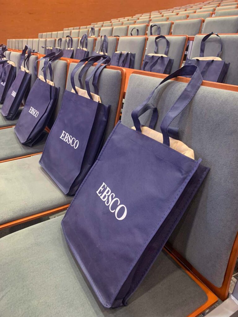 Swag bags in audience seats at EBSCO Open Days Poland